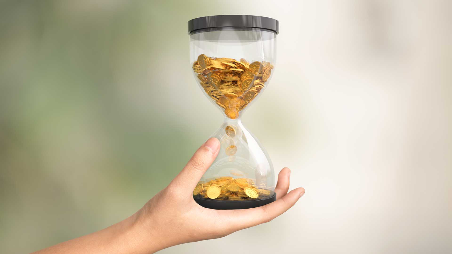 Sablier contenant des pièces d'or, symbolisant le temps et la valeur du change CHF/EUR